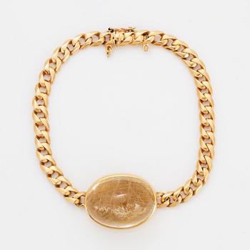 Cabochon-cut rutile quartz bracelet, 18K gold.
