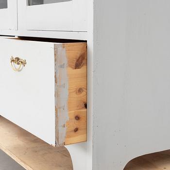 Display cabinet, early 20th century.