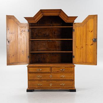 A late Baroque oak cabinet, first part of the 18th Century.