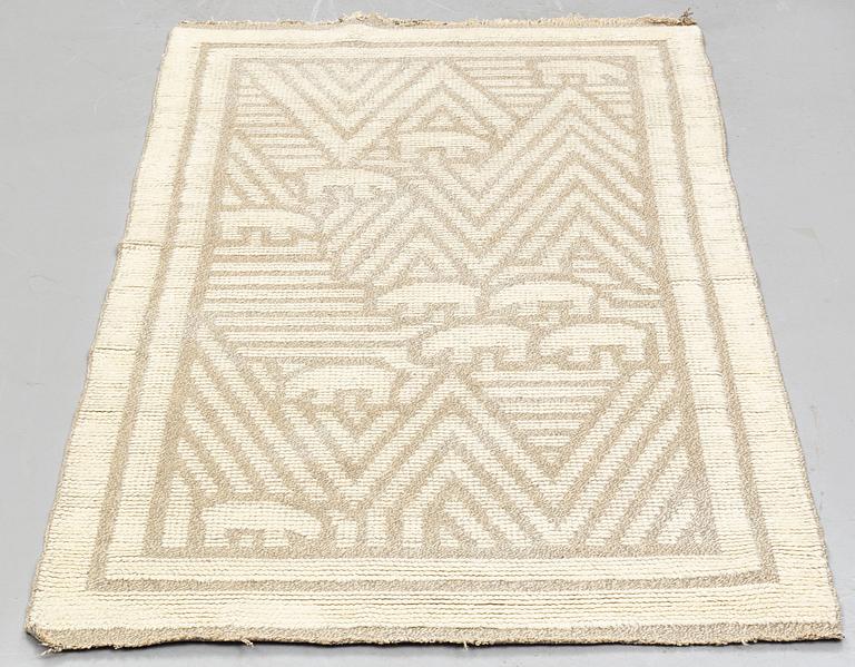 matto, knotted pile in relief, ca 187,5-189,5 x 96,5-100 cm, signed and dated S.K.L.H. 1945 at the back.