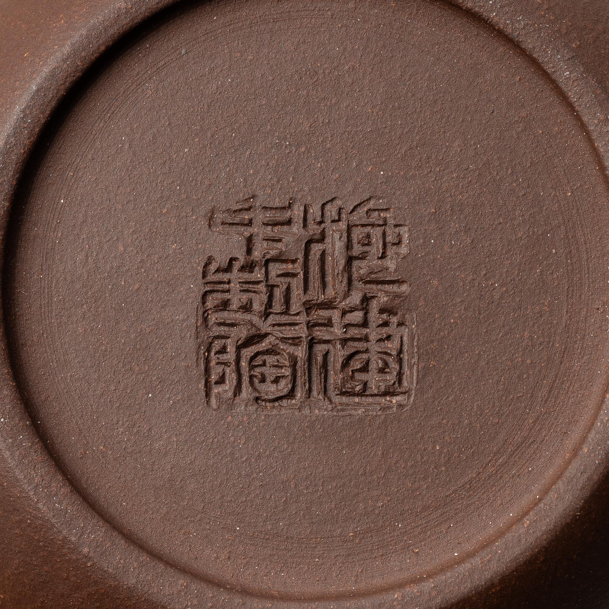 Two yixing teapots, China, 1980s and 2000.