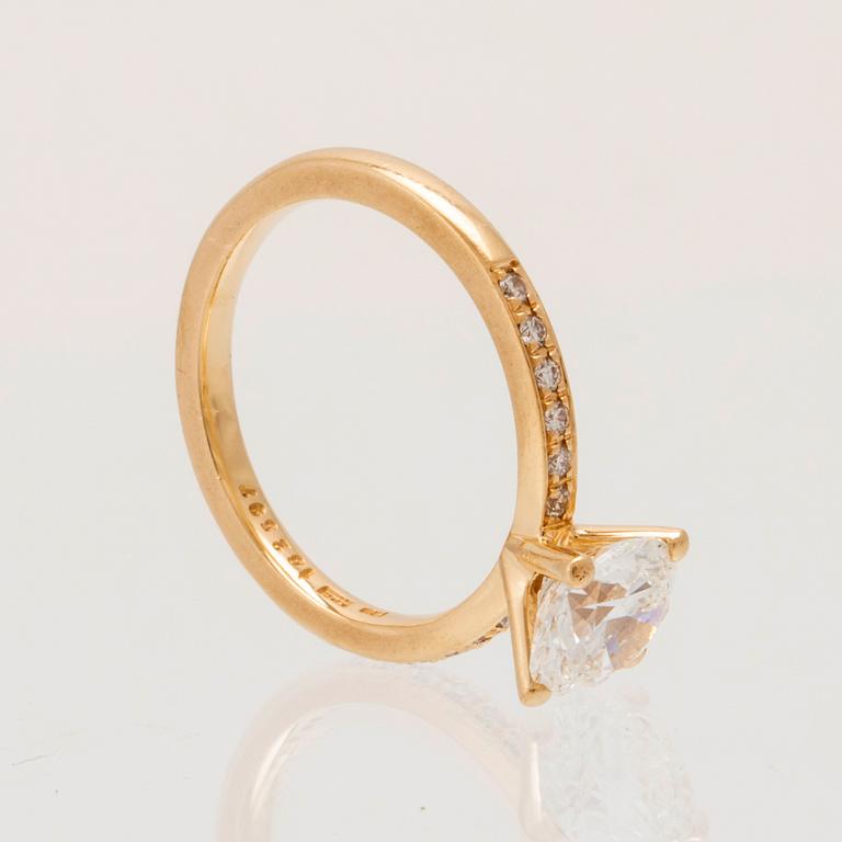 An 18K gold ring set with round brilliant-cut diamonds, GIA report.