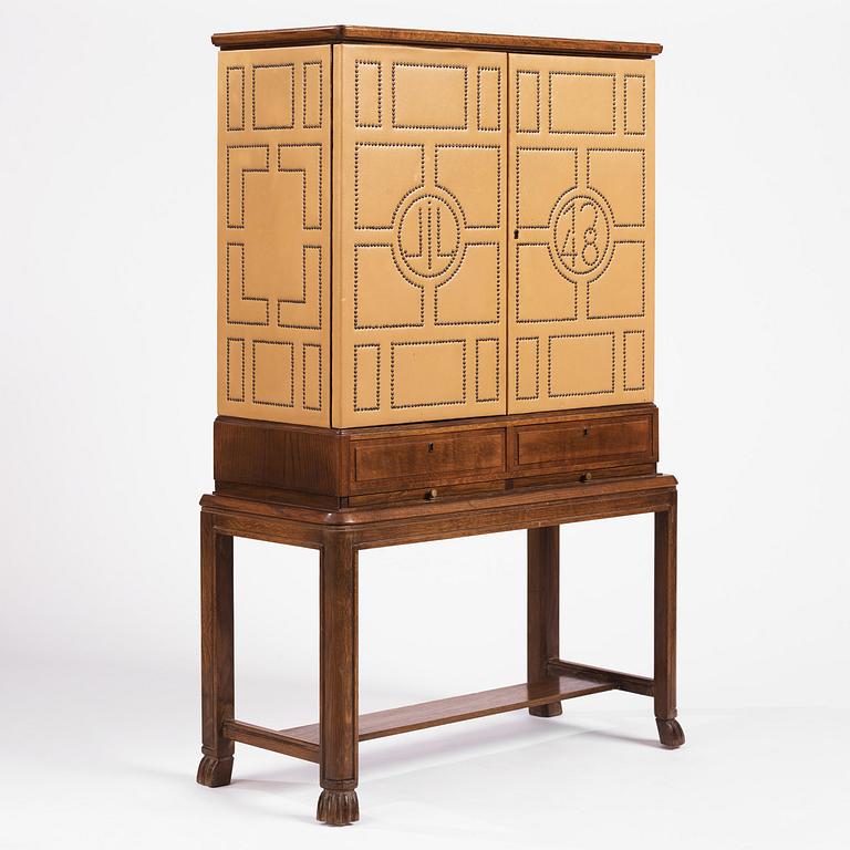 Otto Schulz, a Swedish Modern oak and faux leather bar cabinet, Boet, Gothenburg, 1948.