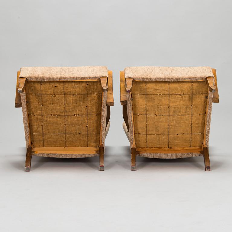 A pair of 1930/1940's open armchairs so called 'K-chair'.