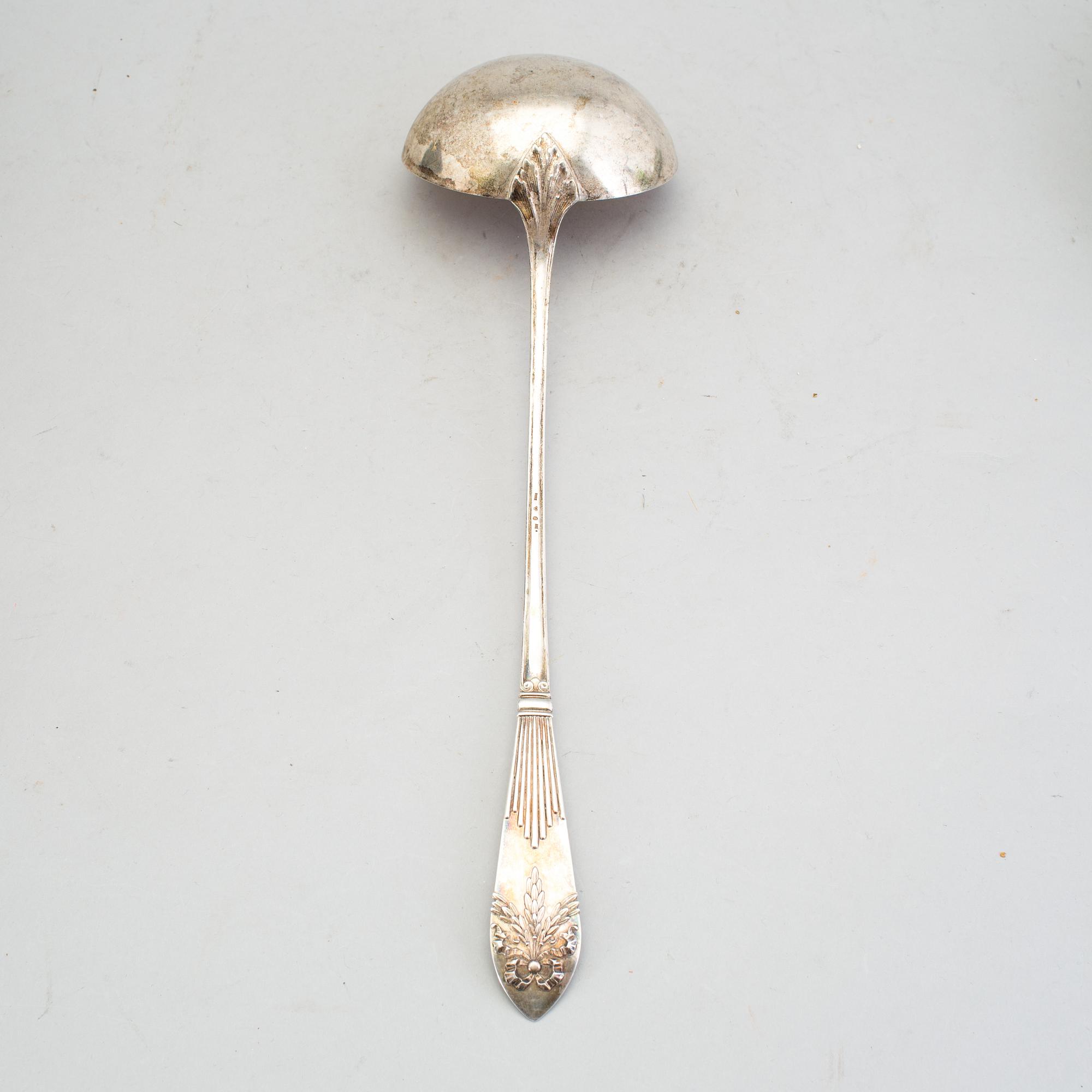 A Swedish early 20th century parcel-gilt soup-ladle, marked CGH, Stockholm 1907.