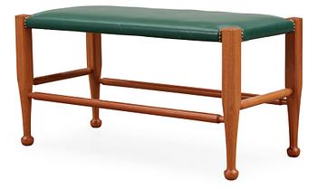 A Josef Frank mahogany and green leather bench, Svenskt Tenn, model 2009.