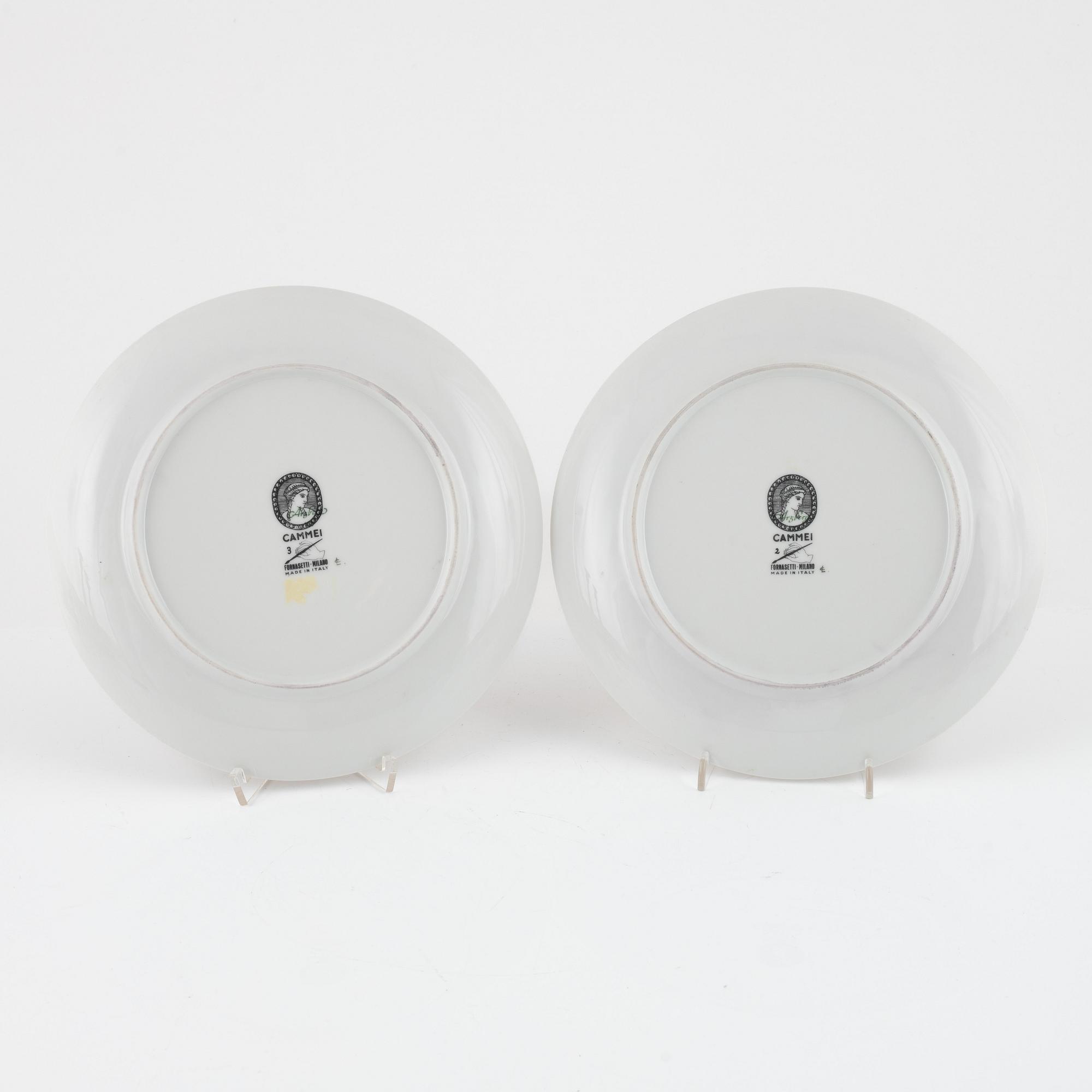 Piero Fornasetti, a pair of porcelain 'Cammei' plates, Fornasetti, Milano.