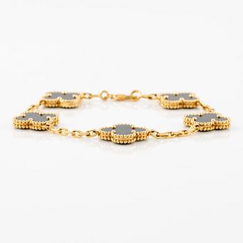 A Van Cleef & Arpels bracelet "Alhambra" 18K gold with onyx.