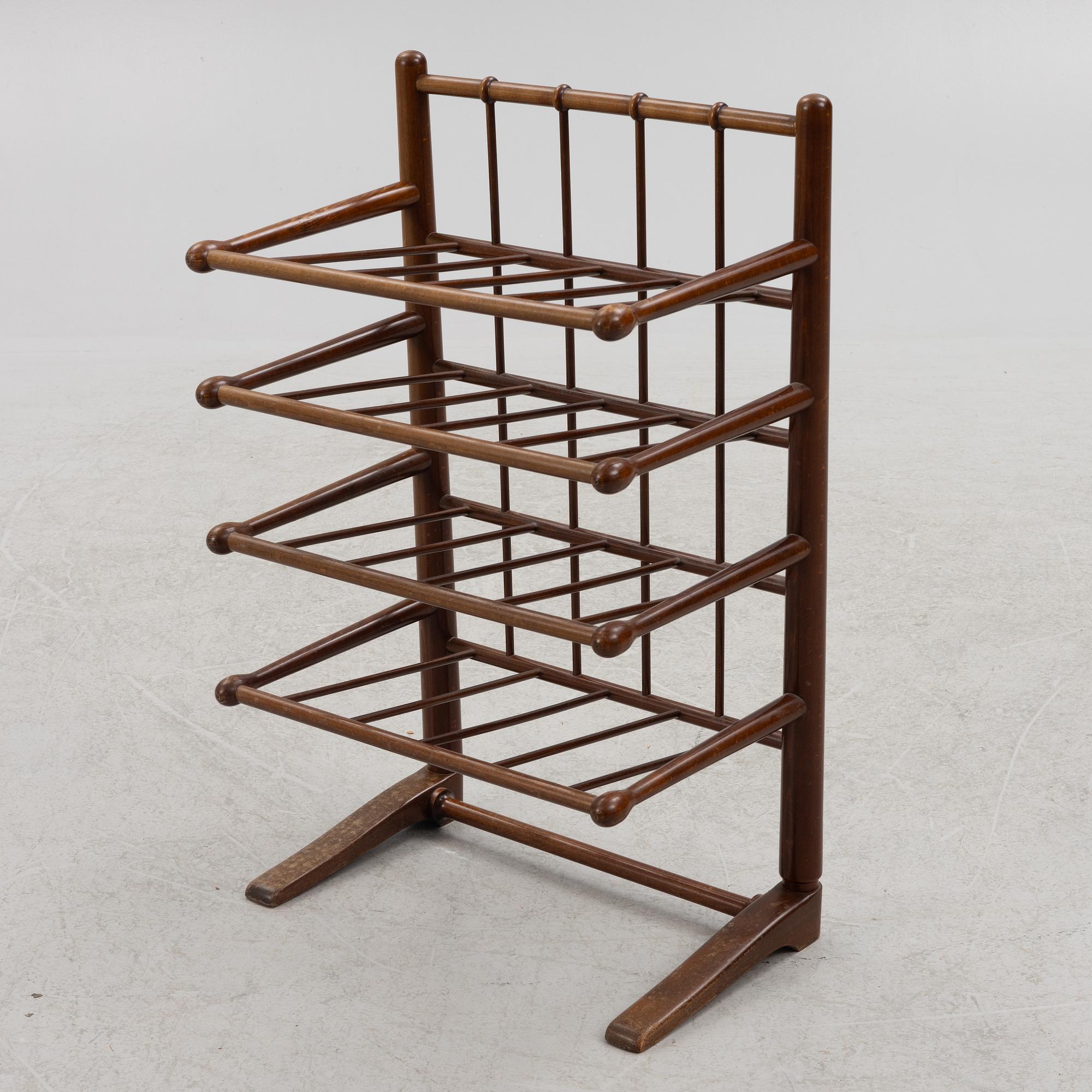 A magazine rack, mid-20th century.