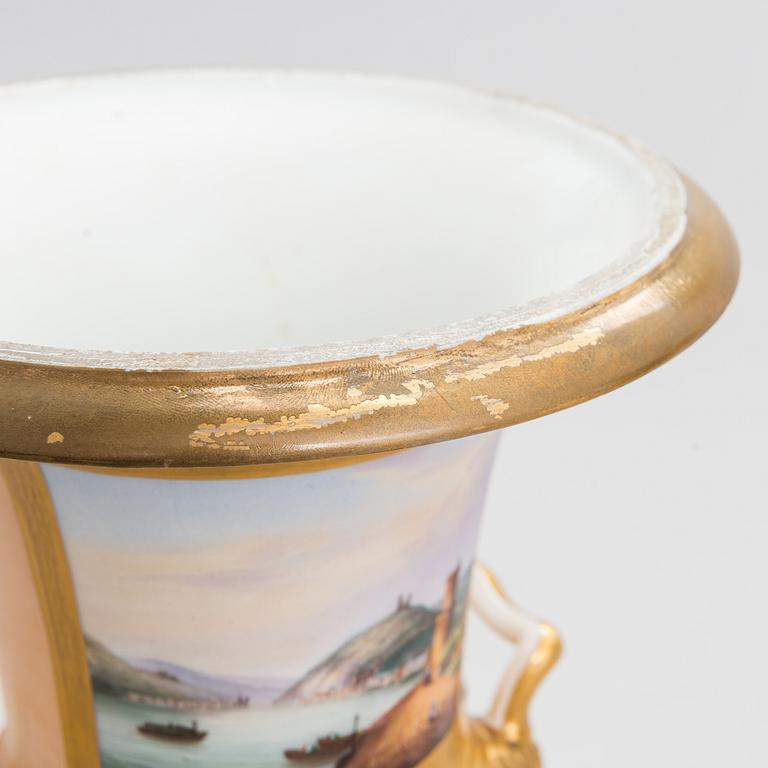 A pair of German porcelain urns from around the mid-19th century.