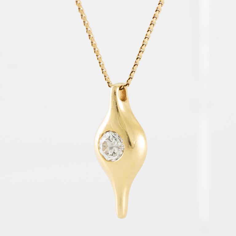 Pendant in 18K gold with a round brilliant-cut diamond.