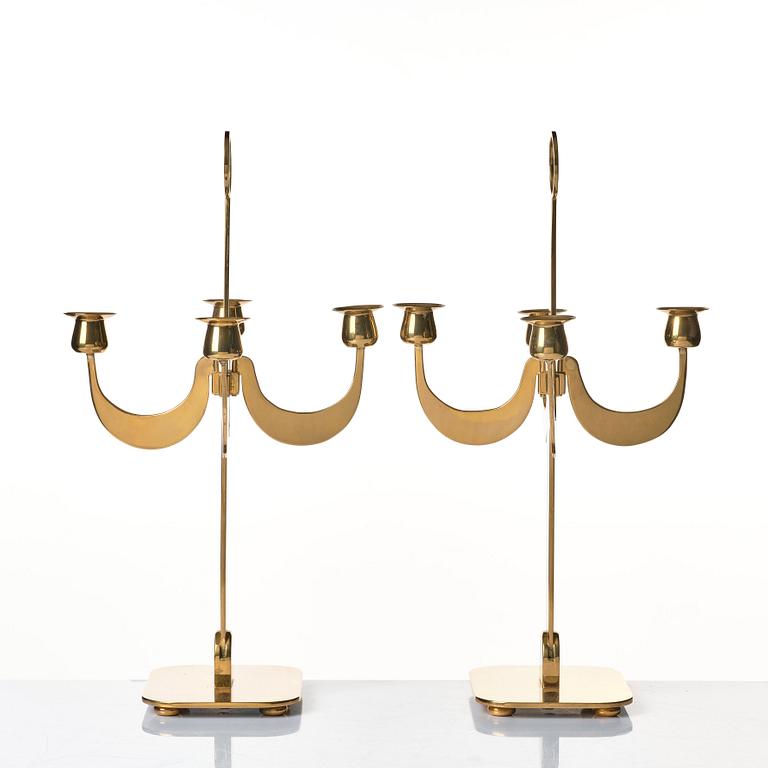 Josef Frank, a pair of brass candelabra by Svenskt Tenn, Sweden 1950's, model nr 2663.