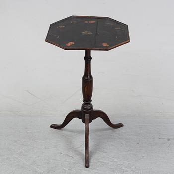 A painted folding table, 19th Century.