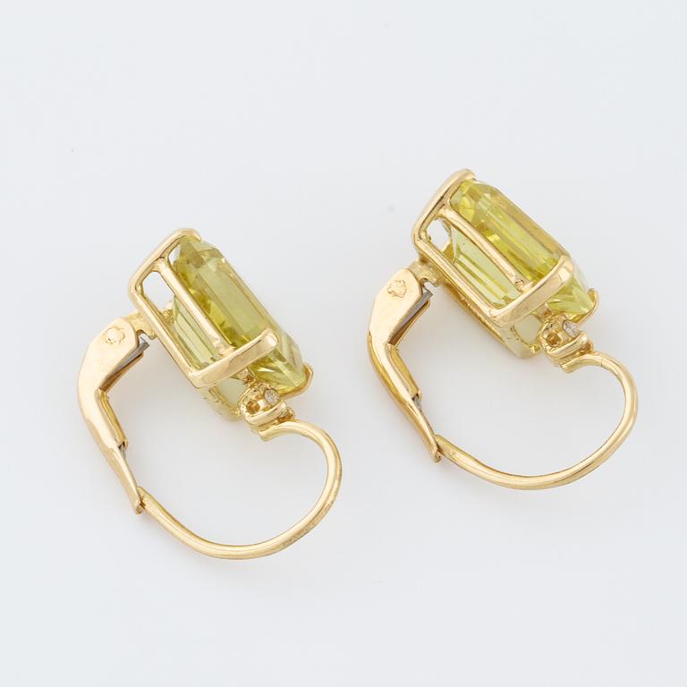 A pair of praseolite quartz and brilliant cut diamond earrings.