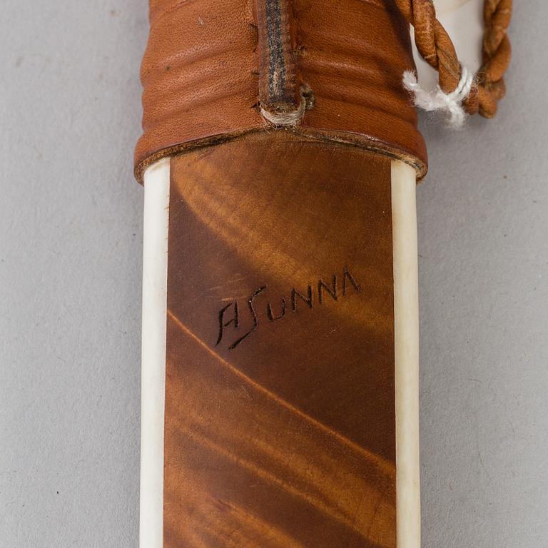 ANDERS SUNNA, a reindeer horn Sami knife, signed A Sunna.