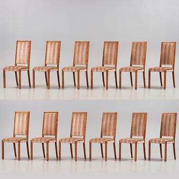 Wiwen Nilsson, a stained birch dining room set with a table and twelve chairs, Sweden 1930-40-tal.