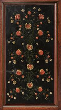 A Swedish polychrome painted folk art corner cabinet, dated 1818.