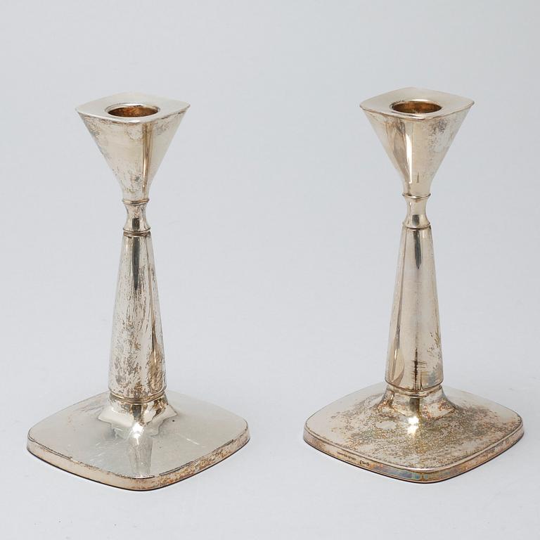 A pair of candlesticks by Thore Eldh for K&EC in Göteborg, 1960s.