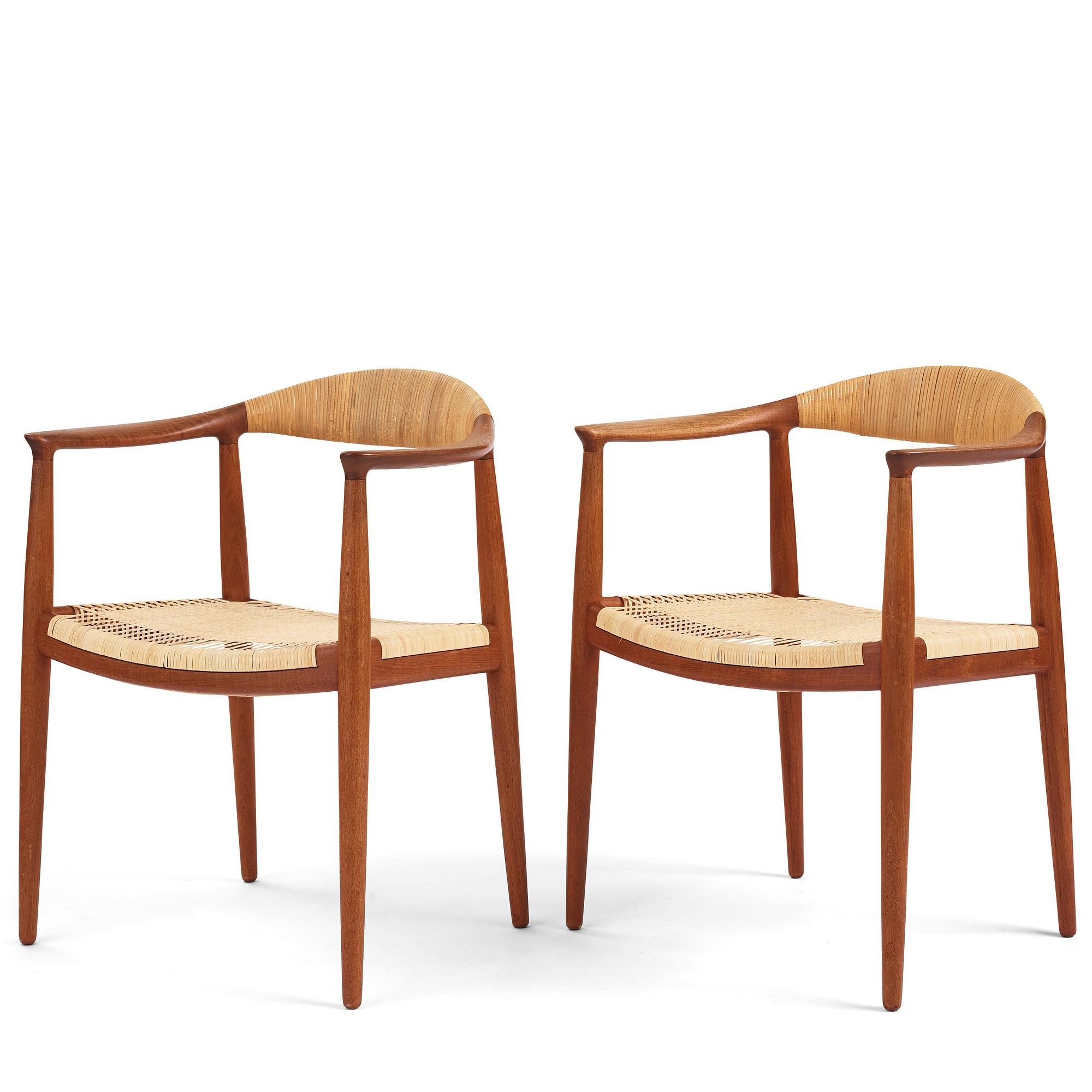 Hans J. Wegner, a pair of teak and rattan 'The Chair', JH-503, Johannes Hansen, Denmark 1950s.