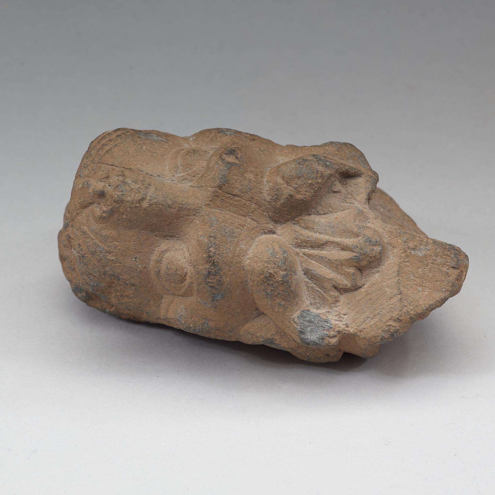 A schist sculpture fragment of a lion, Gandhara, 2nd-3rd Century.