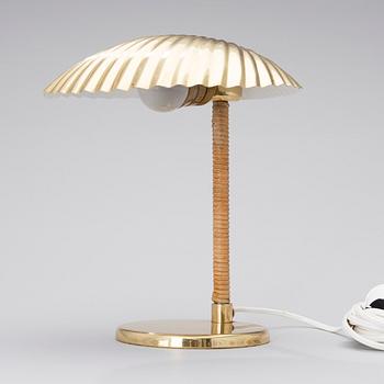 PAAVO TYNELL, A DESK LAMP. Shell. Manufactured by Taito Oy. Designed in 1938/39.