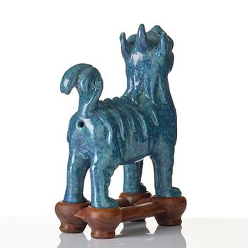 A turquoise/robins egg glazed figure of a buddhist lion, Qing dynasty, Jiaqing (1796-1820).