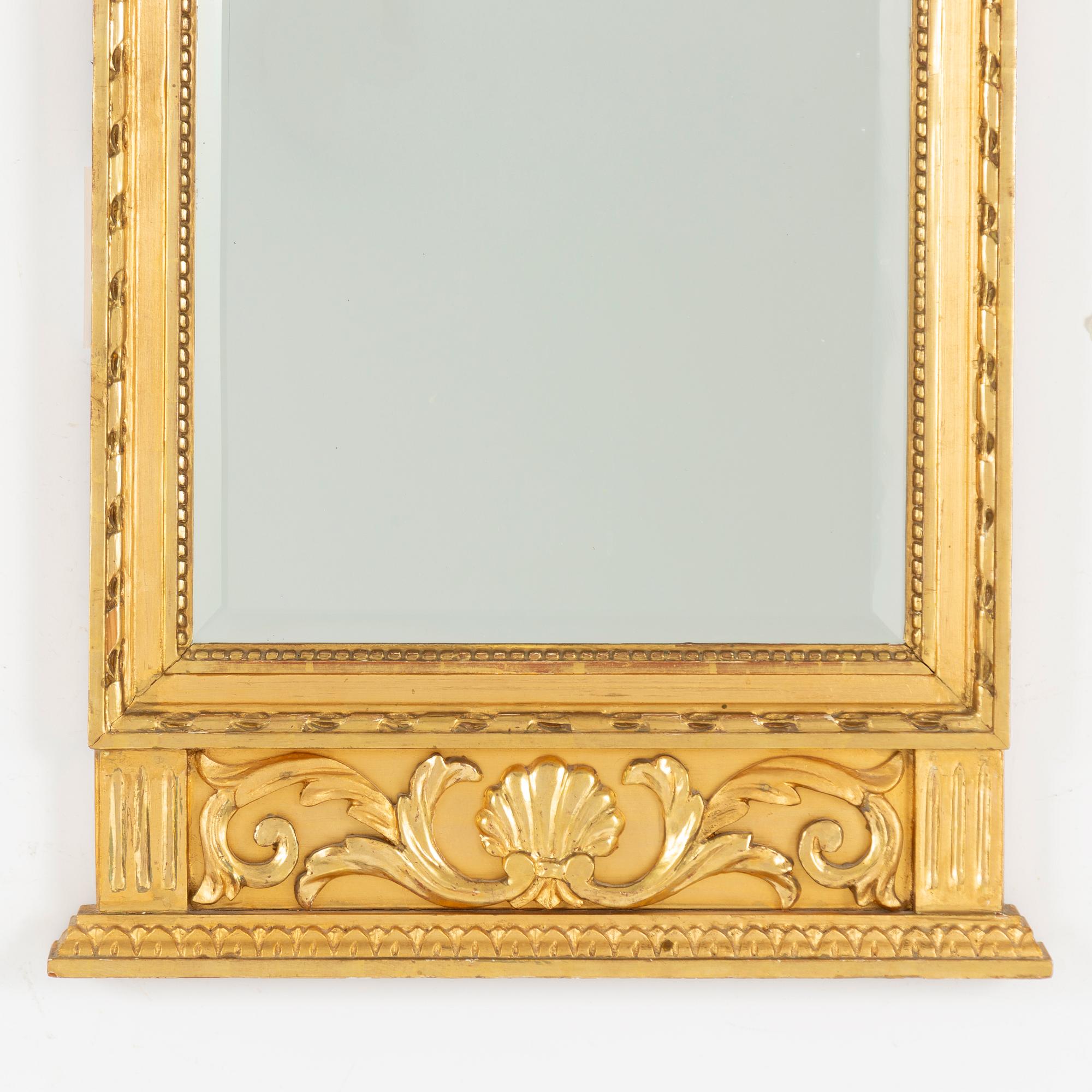 A late Gustavian style mirror, John Lundmark, early 20th Century.