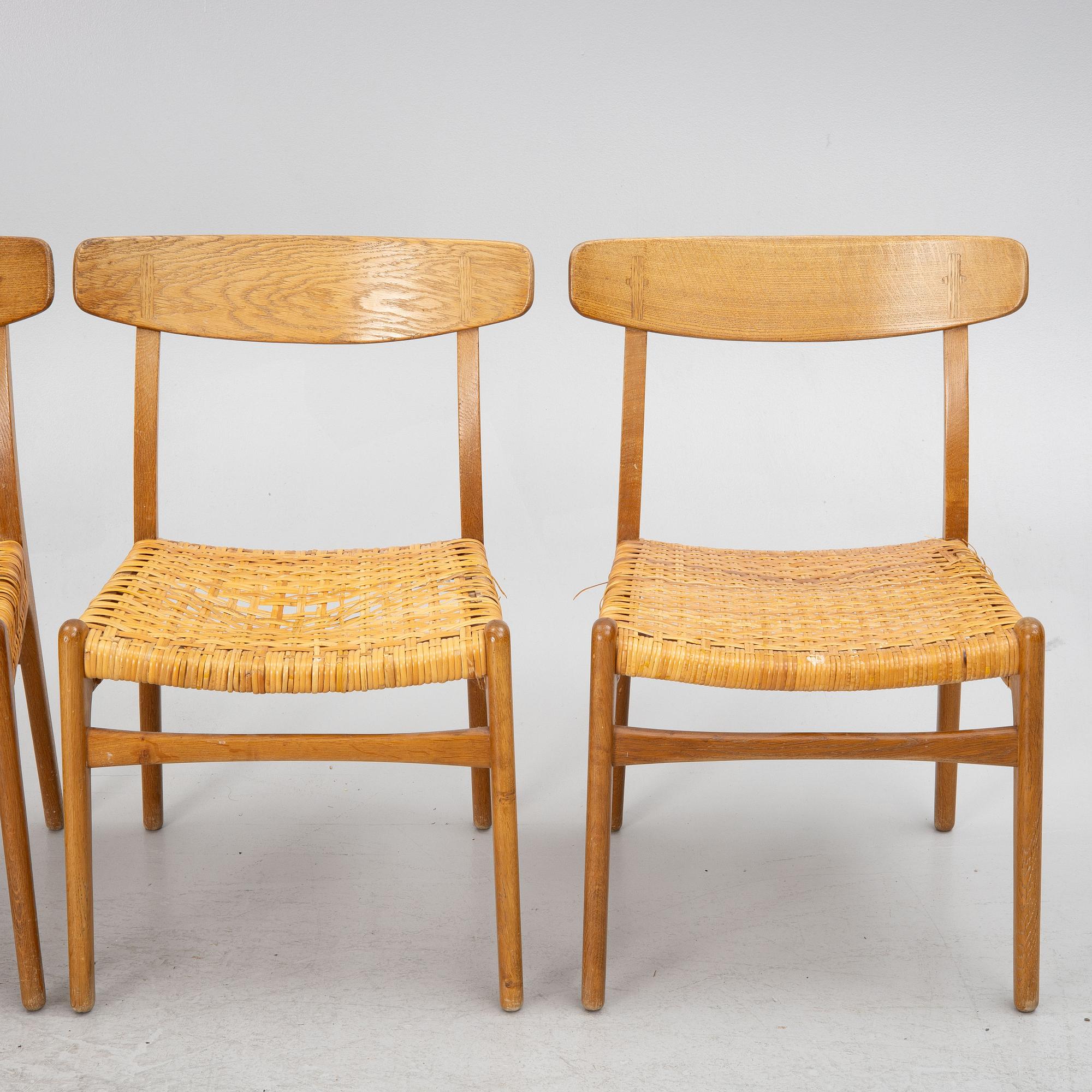 Hans J.Wegner, four dining chairs, model "CH-23",, Denmark, second half of the 20th century.