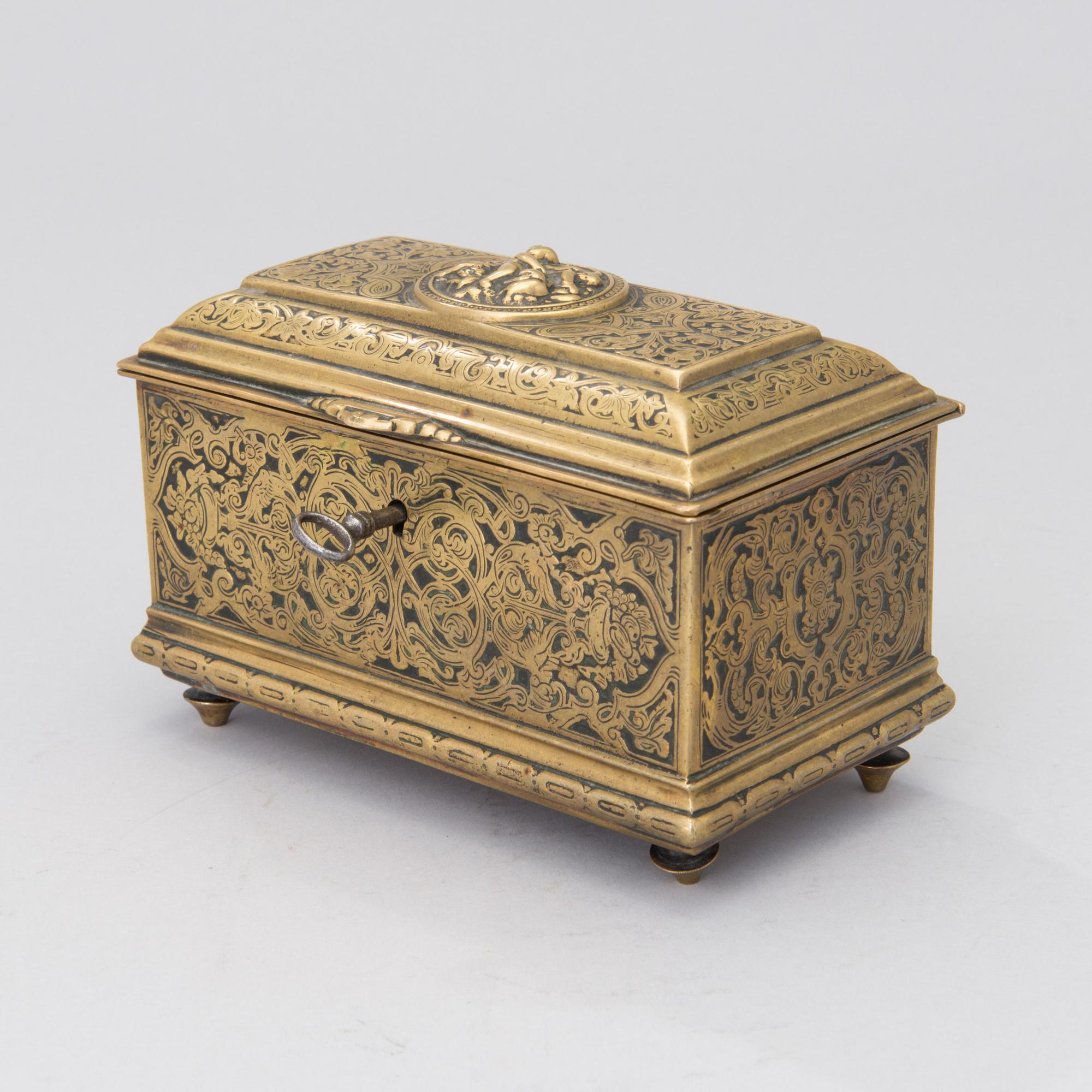 A Renaissance style brass box, Adolf Frankau & Co, London, from the late 19th century.