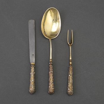 A German 17th century silver-gilt and filigree three-piece travel cutlery, unmarked.