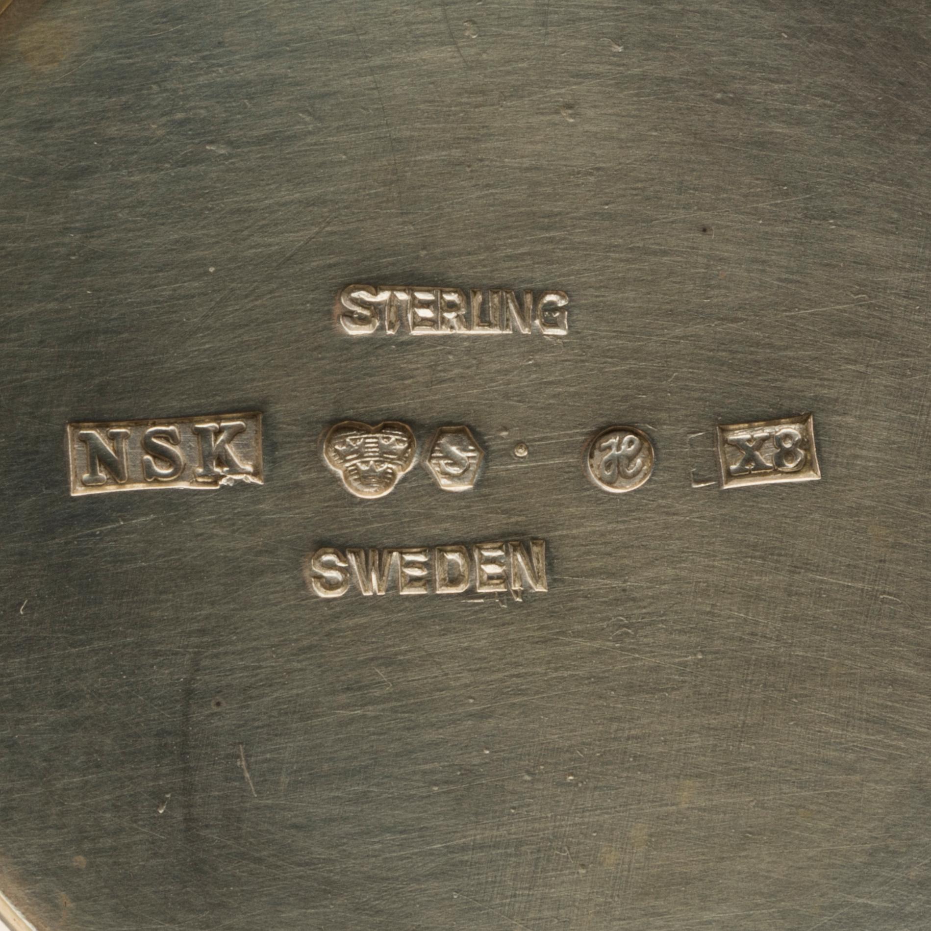 A Swedish 20th century sterling jug mark of Nordisk silverkonst Helsingborg 1948, total weight 347 gr.