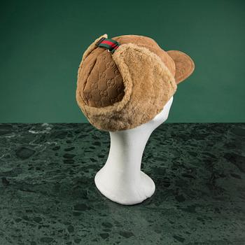 A fue hat by GUCCI in size M.