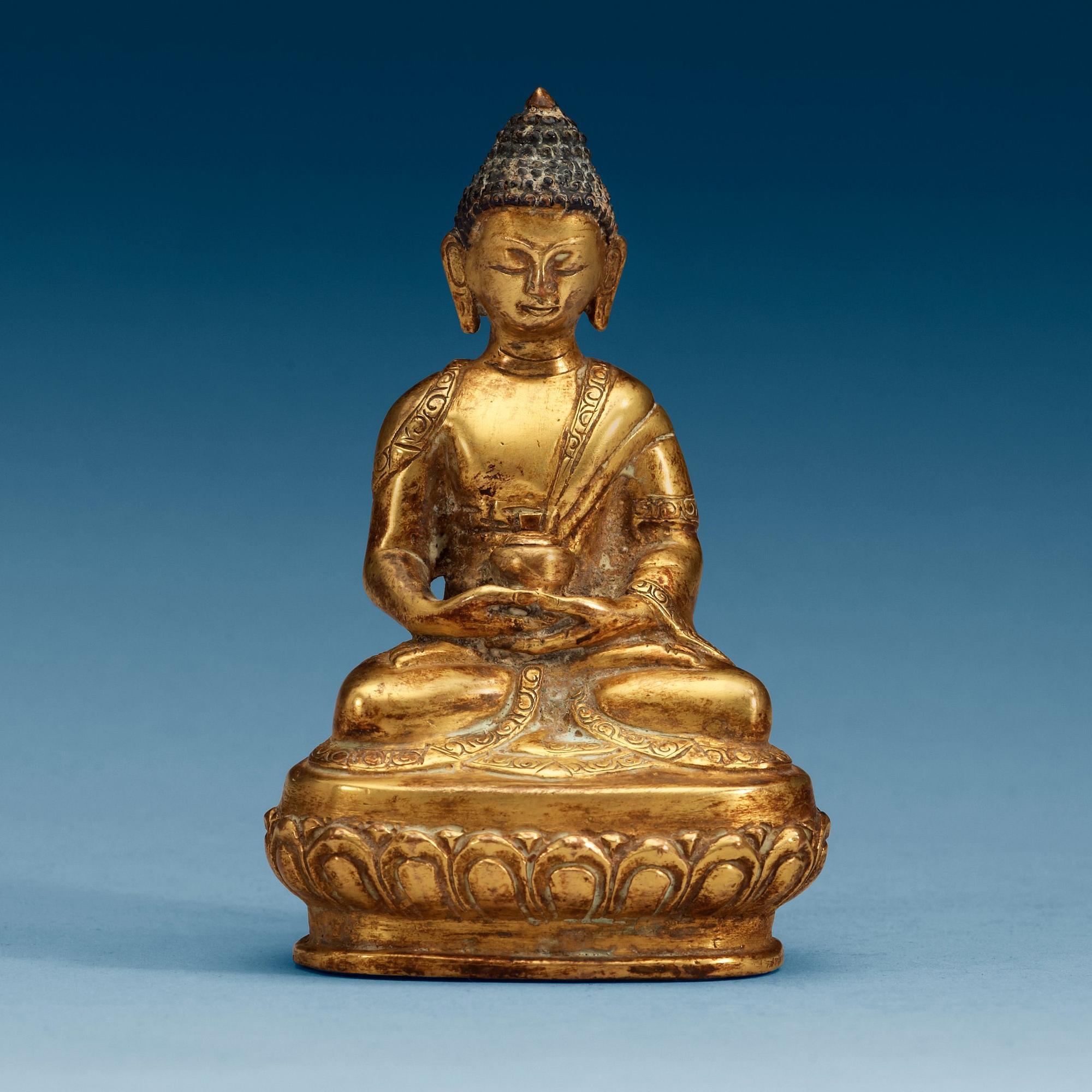 A gilt bronze figure of Buddha Bhaisajyaguru, Qing dynasty (1644-1911).
