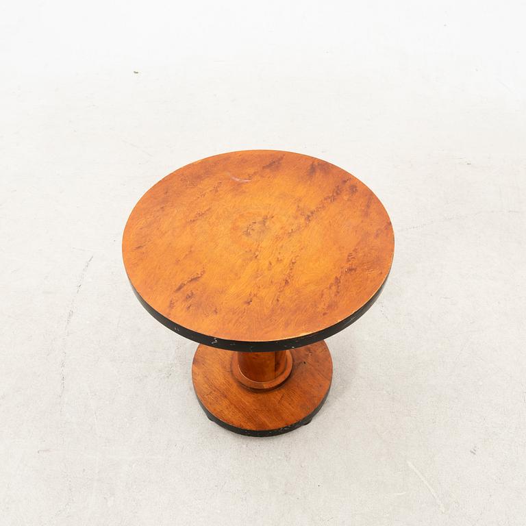 A veneered art déco table from the 1930's.