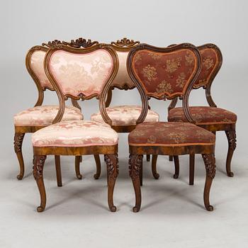 A set of five chairs.