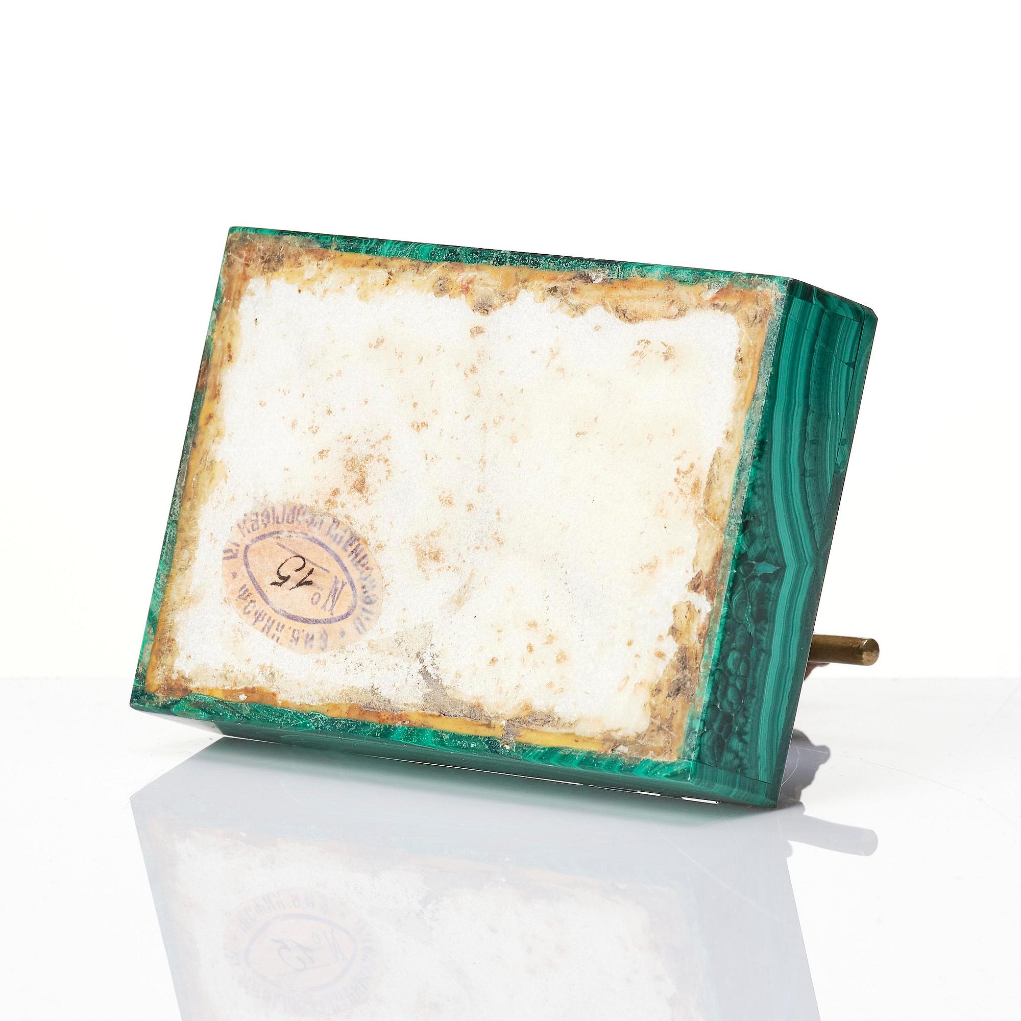 A Russian Nicholas II malachite-veneered and gilt-bronze paperweight, late 19th century.