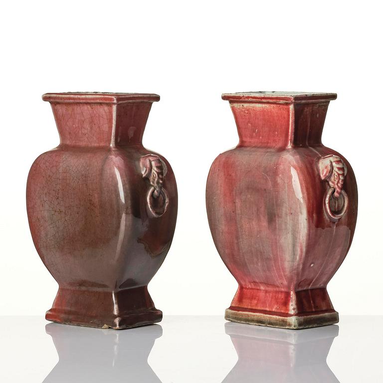 A pair of red glazed vases, Qing dynasty 18th/19th century.