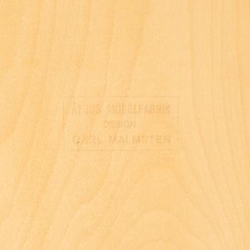 A 'Släden' nesting table by Carl Malmsten.