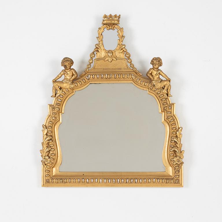 A Baroque style mirror, late 19th Century.