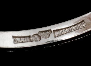 RING, 18k guld med två briljantslipade diamanter, tot 0.62 ct, stämplad MAG, Göteborg, 1981. Vikt 4 g.
