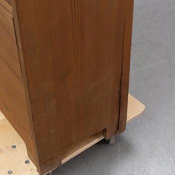 A stained pine bookcase attributed to Carl Westman, early 20th Century.