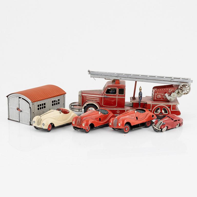 A set of five toy cars, mostly Schuco, Germany.