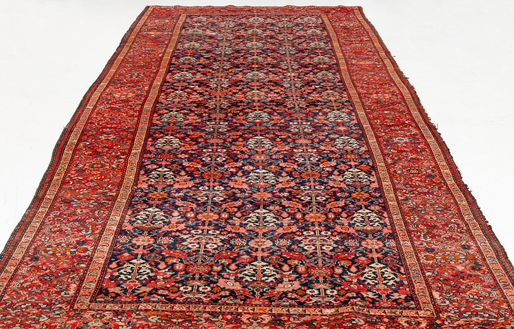 A Farahan carpet, c. 520 x 205 cm.
