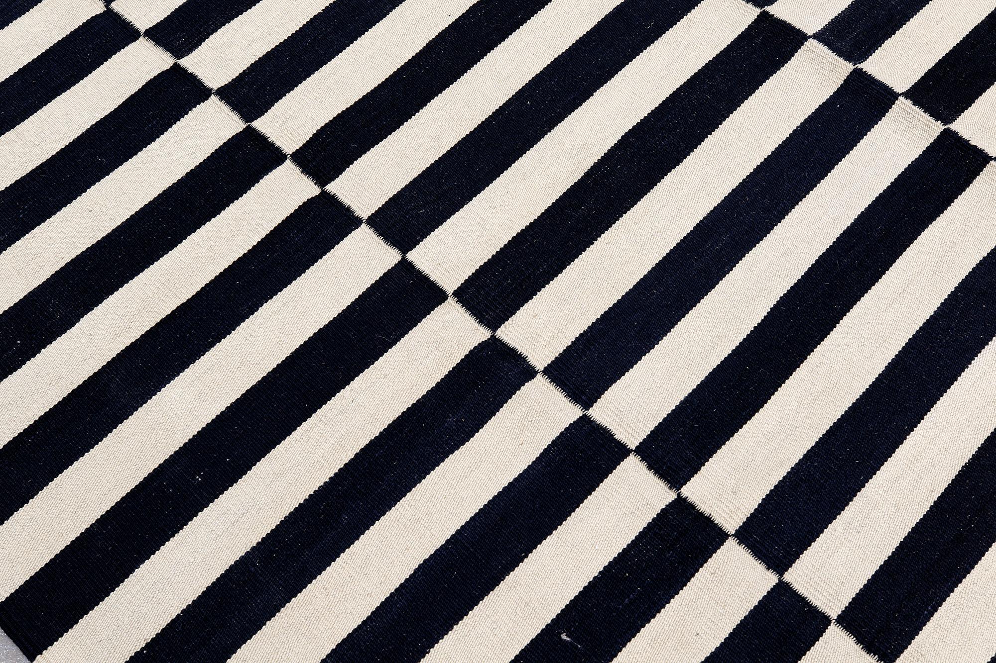 A carpet, flat weave, ca 288 x 210 cm.