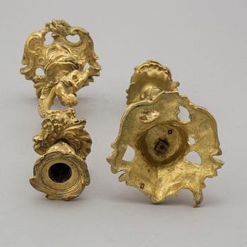 A PAIR OF ORMOLU ROCOCO STYLE CANDLESTICKS, 19th century.