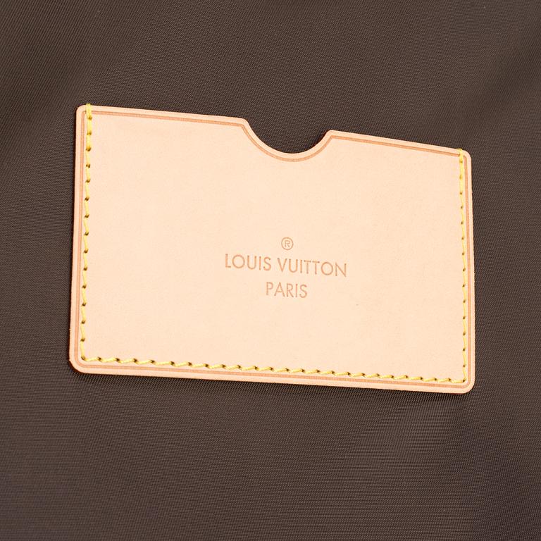 A Monogram Canvas "Zephyr" Suitcase by Louis Vuitton.