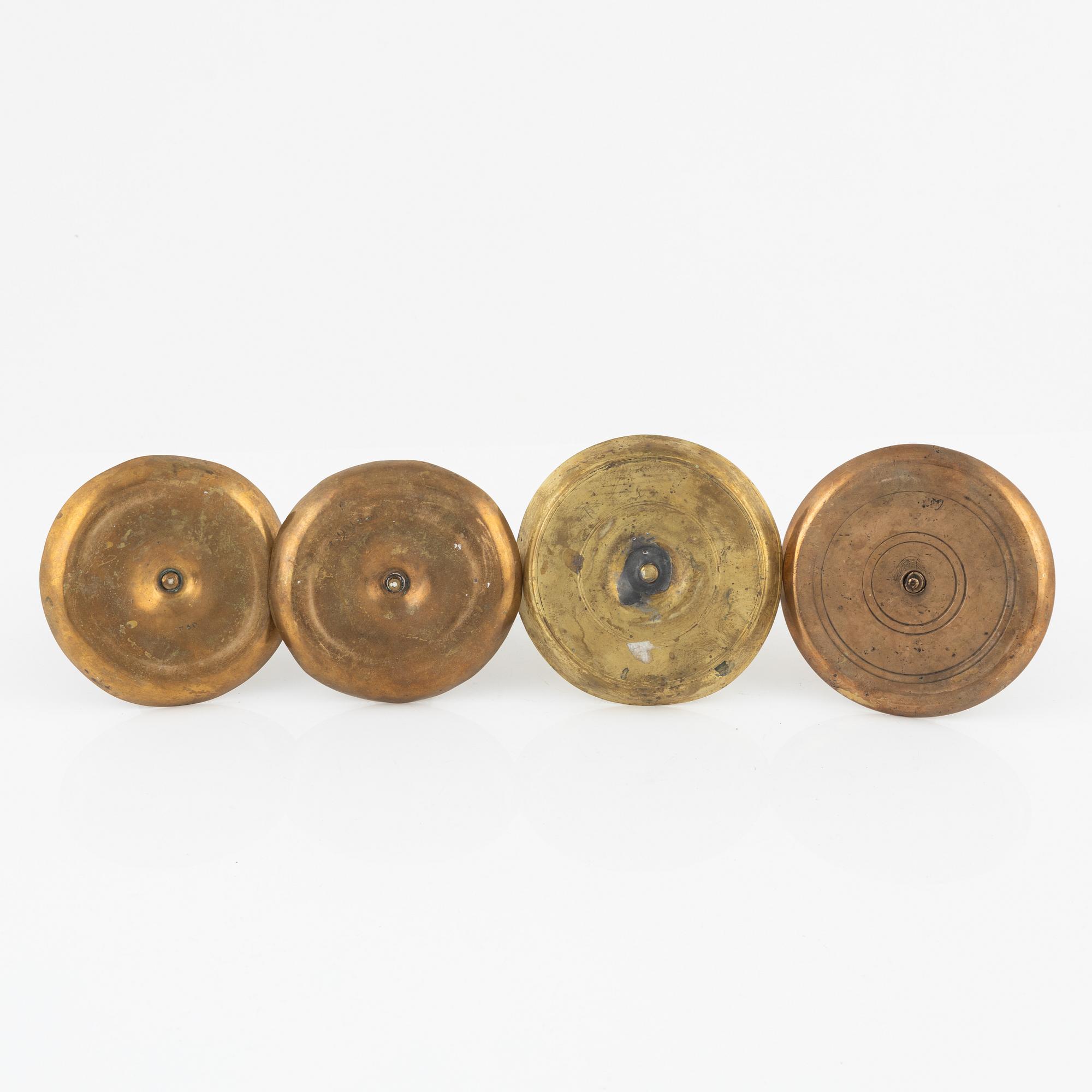 Four bronze candlesticks, a pair of which Skultuna model N 60, 18th-19th Century.