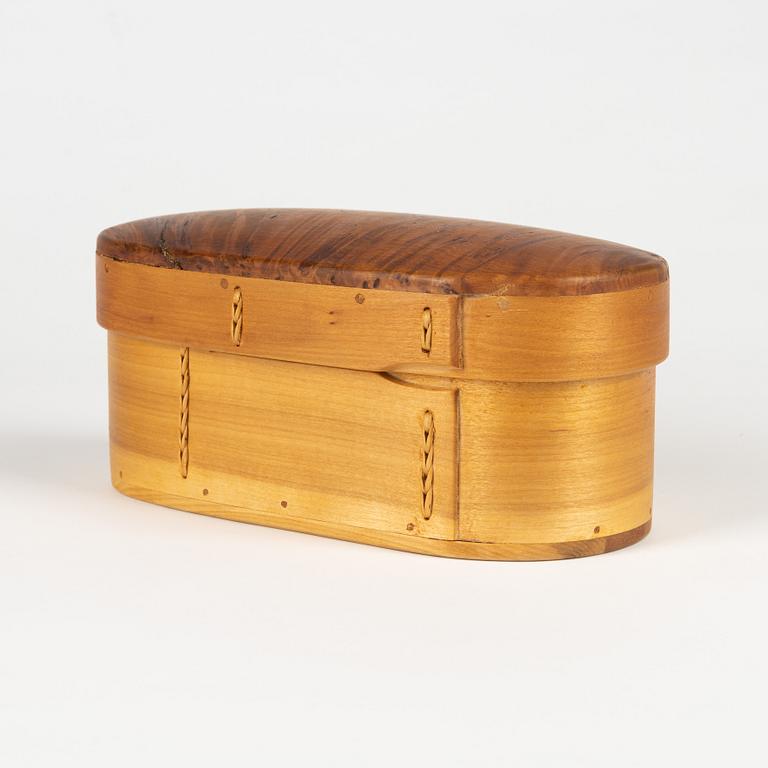 A birch box, signed BM.