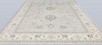 A rug, Ziegler design, approx. 368 x 279 cm.