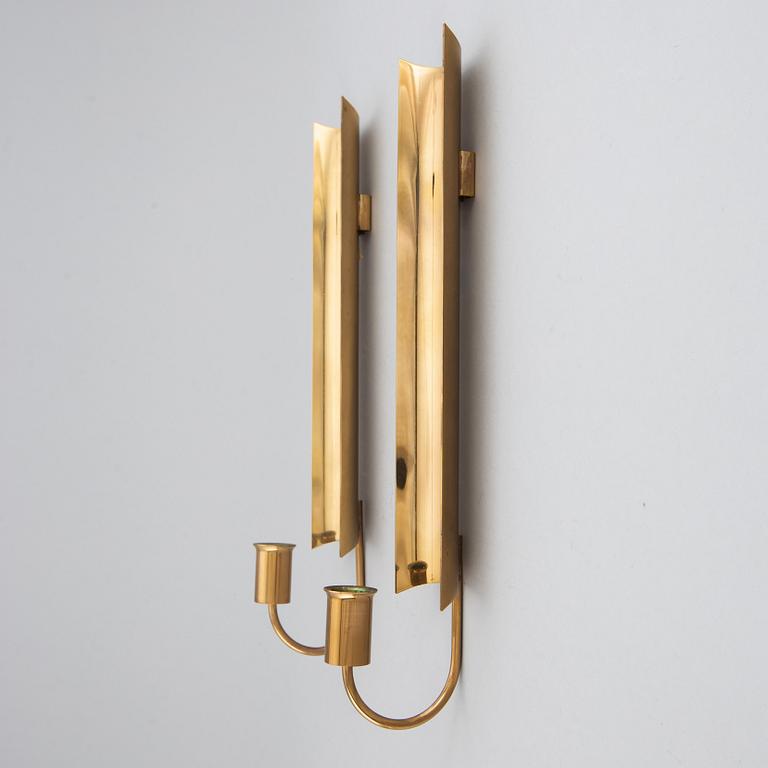 PIERRE FORSSELL, four brass wall sconces, Skultuna.